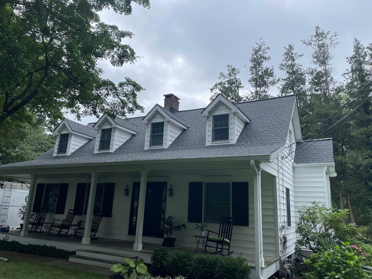 Cape Cod style home with completed roof replacement